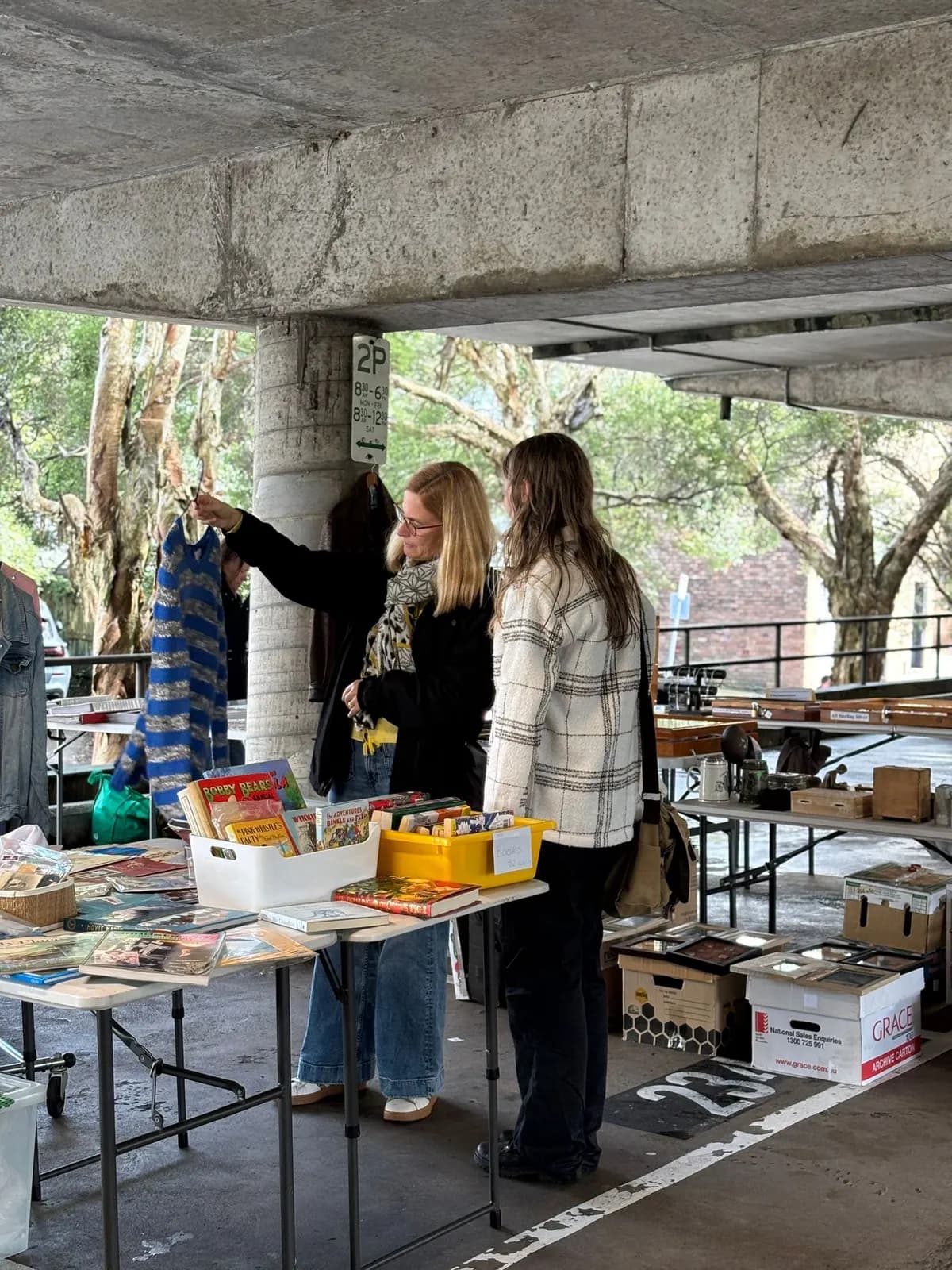 Stalls and shoppers at the Gordon Markets