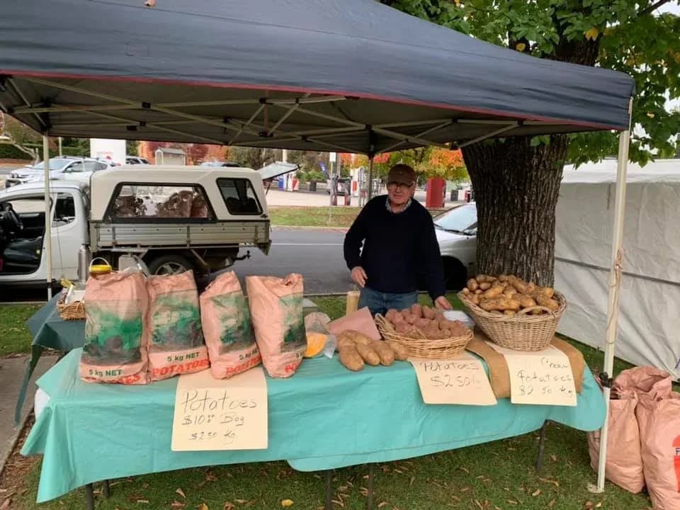A bread stall under a marquee at Beaufort Town Market