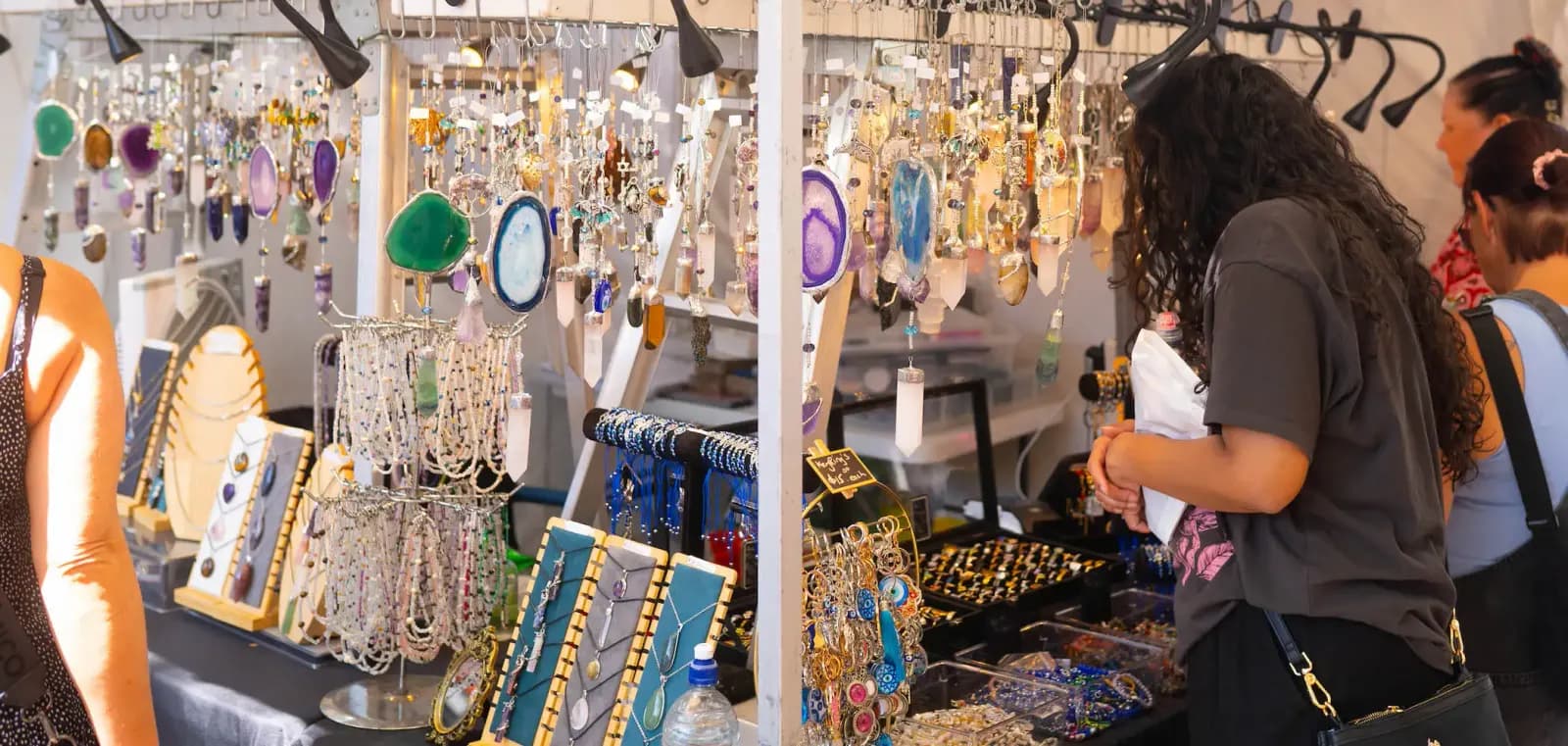 A shopper at a jewellery stall at The Collective Markets South Bank
