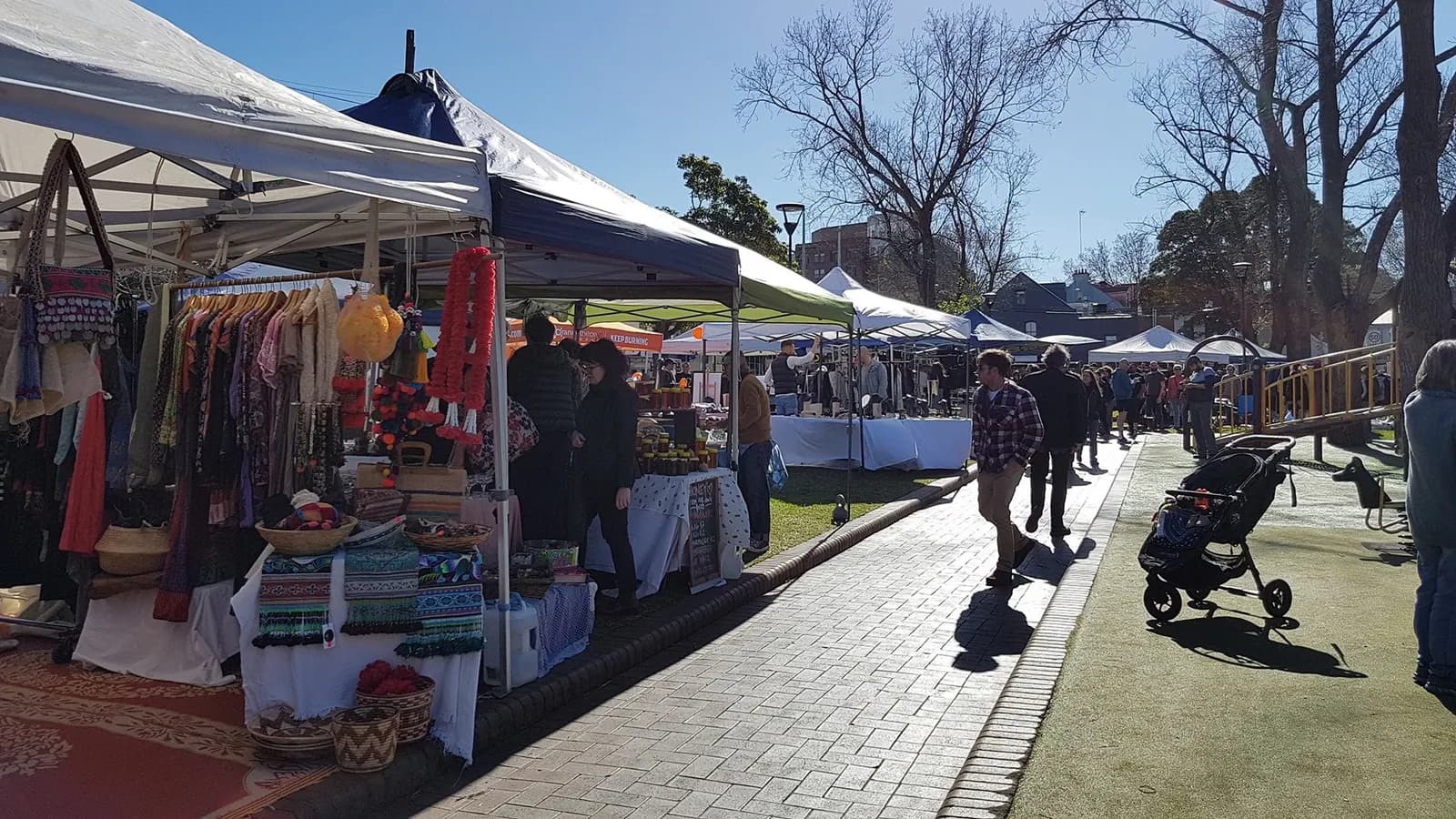 Clothing stalls along the path at Surry Hills Market