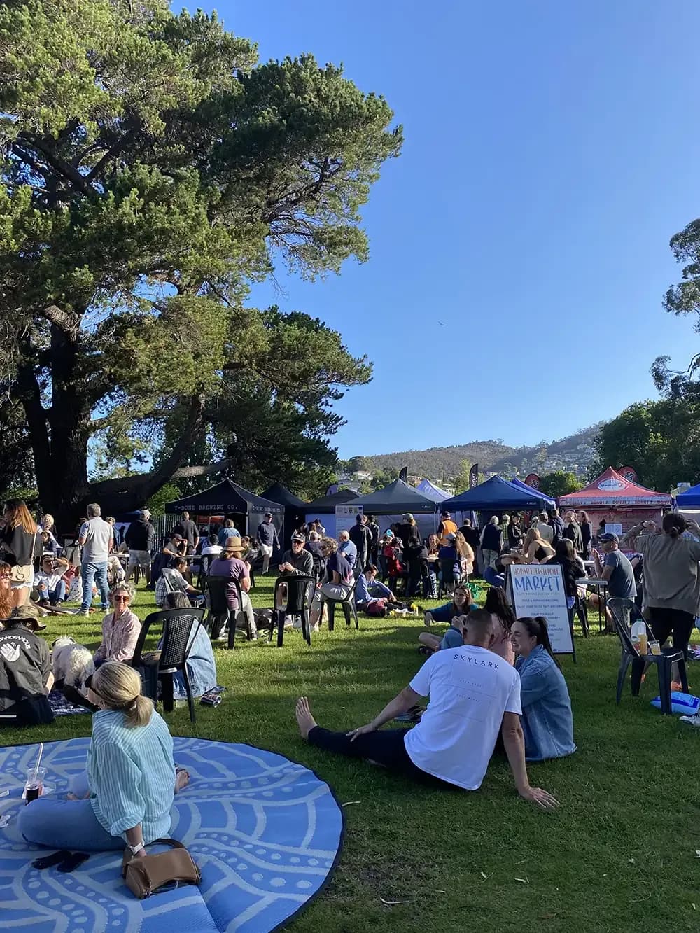 Crowds on the lawn at the Hobart Twilight Market, Long Beach