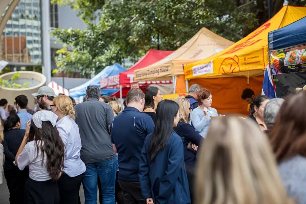 Lunchtime crowd at the food stalls at Brisbane City Markets