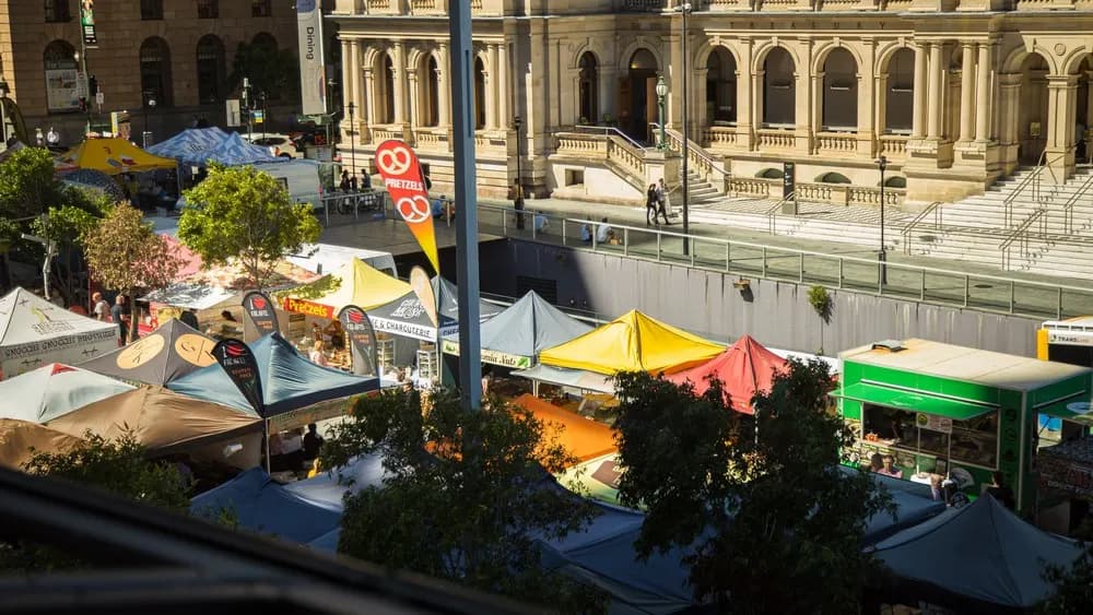 Market tents in Reddacliff Place seen from above at Brisbane City Markets