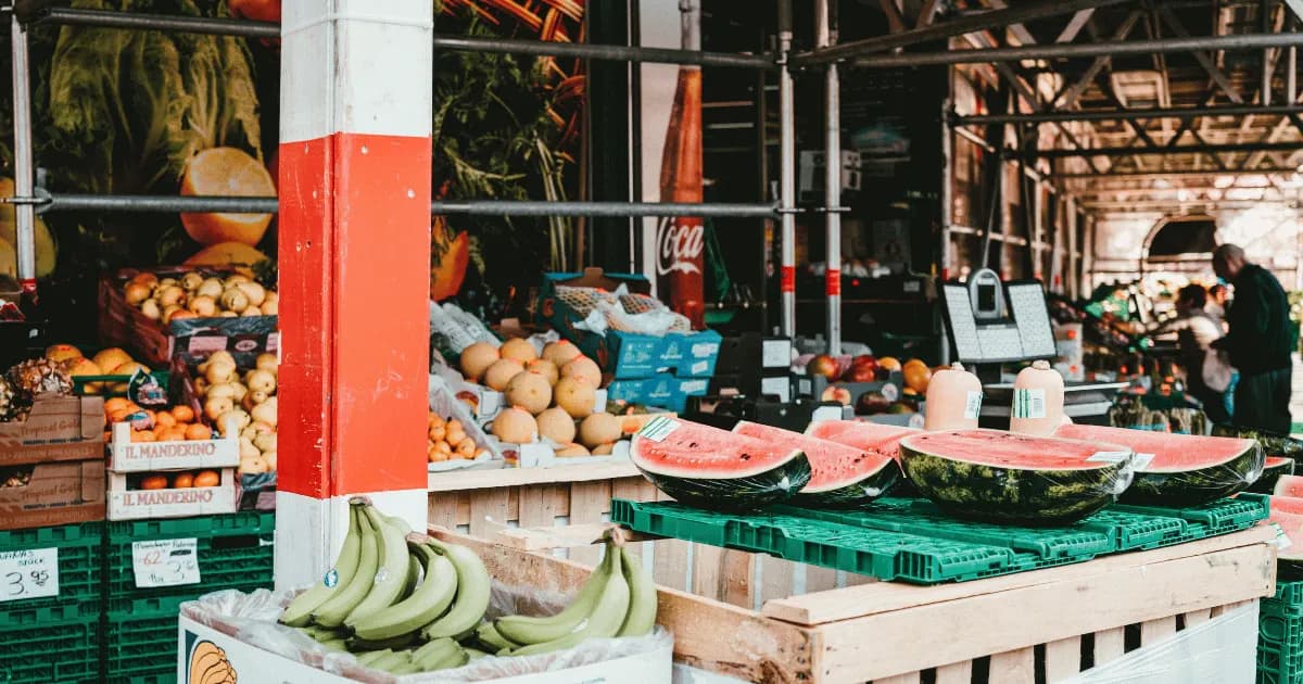 Produce stalls inside the market shed at Market City in Canning Vale