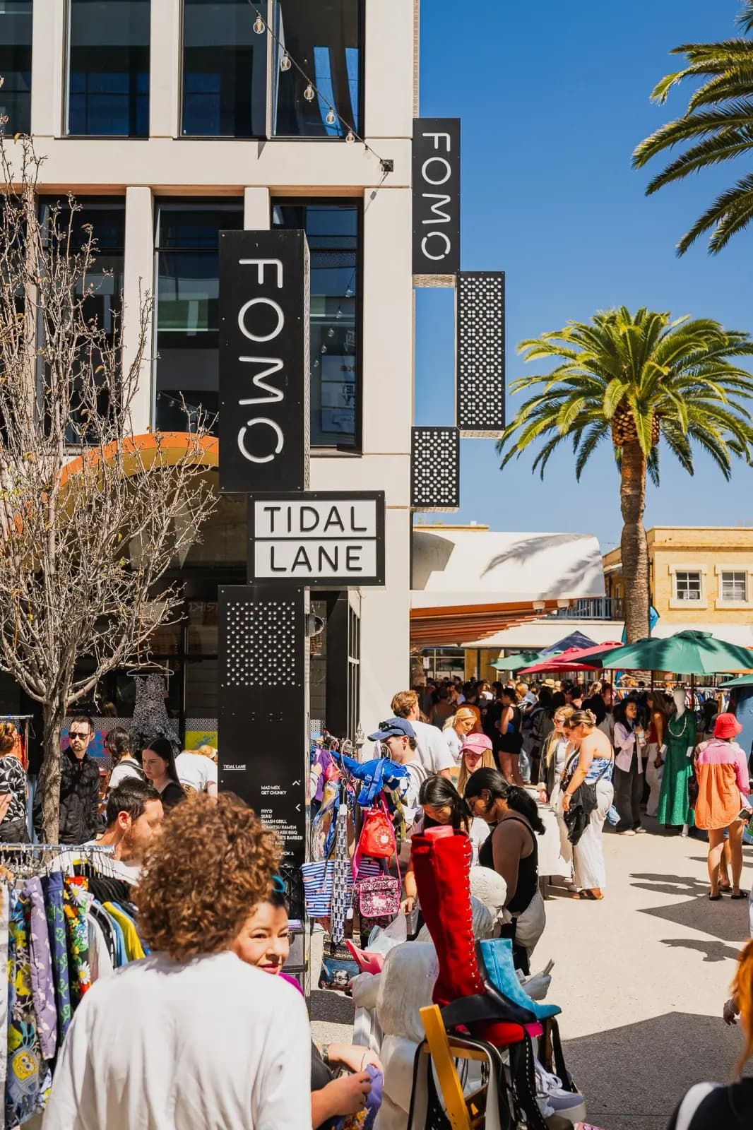 Shoppers at the Pre Loved Clothing Market beside Tidal Lane in Fremantle